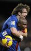 Carles-Puyol-se-abraza-a-Etoo-_54402010690_54115221157_400_640.jpg